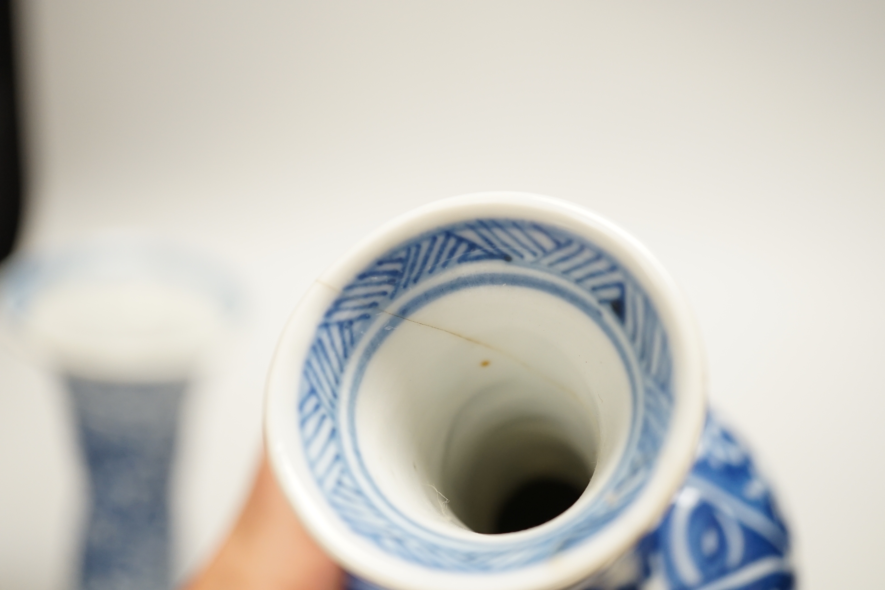 Four Chinese Kangxi period blue and white small vases, tallest 16cm high